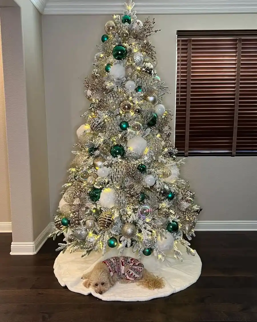 2. Flocked Trees with Warm Amber Lights
