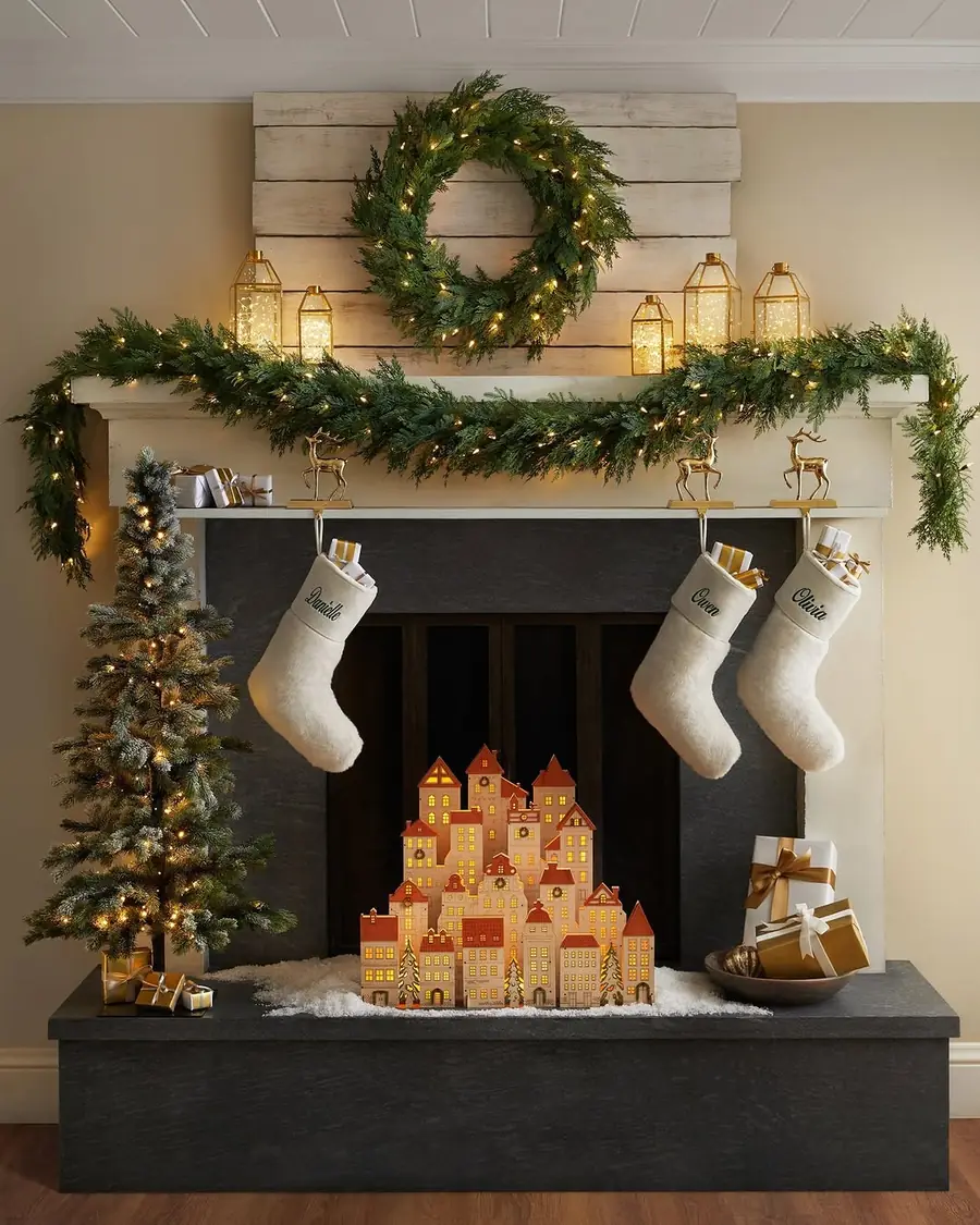 2. Burgundy Garland and Brass Candles on the Mantel